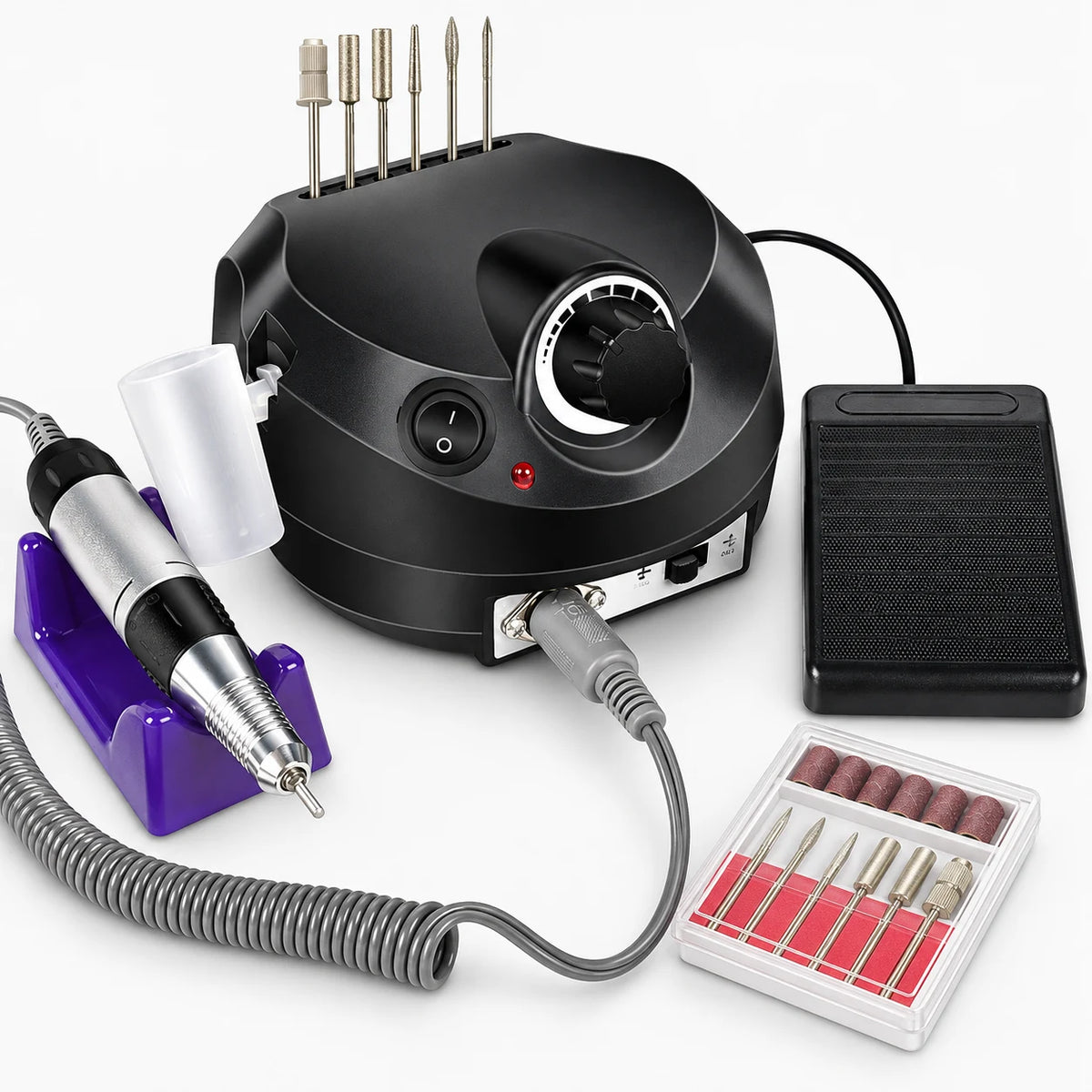 Electric Nail Drill Kit — the control unit, handpiece, foot pedal and bits on white